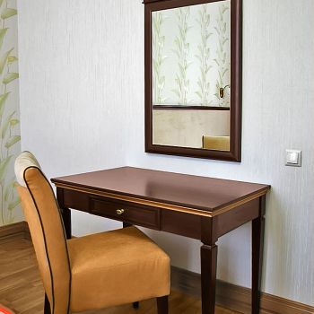 Photo of dressing table with a mirror from series of furniture for hotels Karolina
