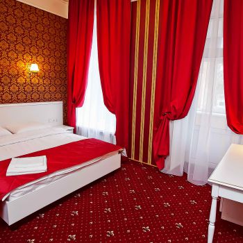 Photo of double bed and dressing table from series of furniture for hotels Verona