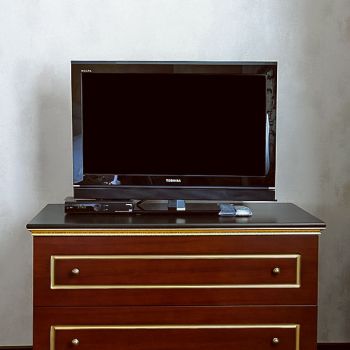 Photo of chest of drawers for TV in hotel furniture Vettriano