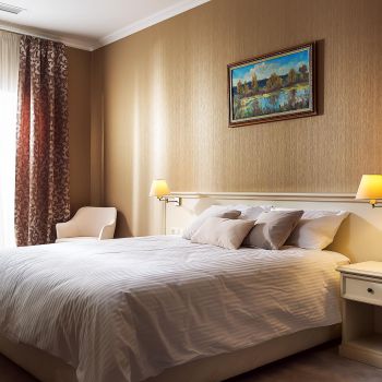 Photo of double bed with bedside tables with one drawer; hotel furniture  Voyage