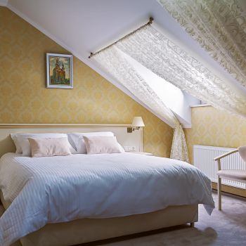 Photo of double bed with bedside tables with one drawer, armchair; Alexis; coffee table; hotel furniture Voyage