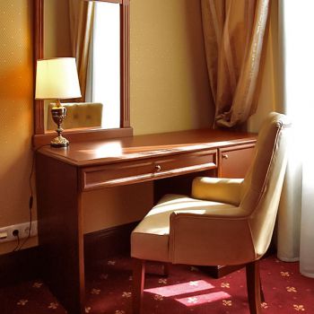 Photo of dressing table with mirror from series of furniture for hotels Voyage