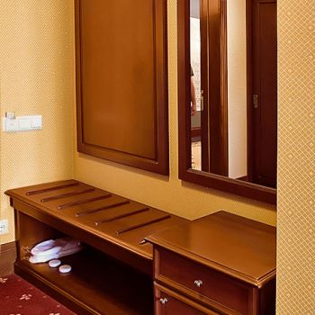 Photo of hangers with luggage stand and stands with mirror; hotel furniture Voyage